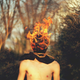 Illustration for article titled Staggering Photos that Combine Self-Portraiture with Surrealism